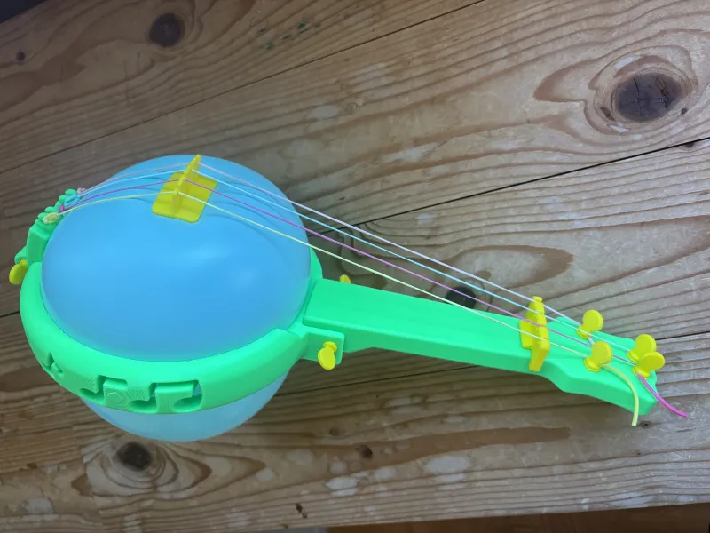 A 3D-Printed Balloon Banjo Uses a Party Balloon as a Resonator