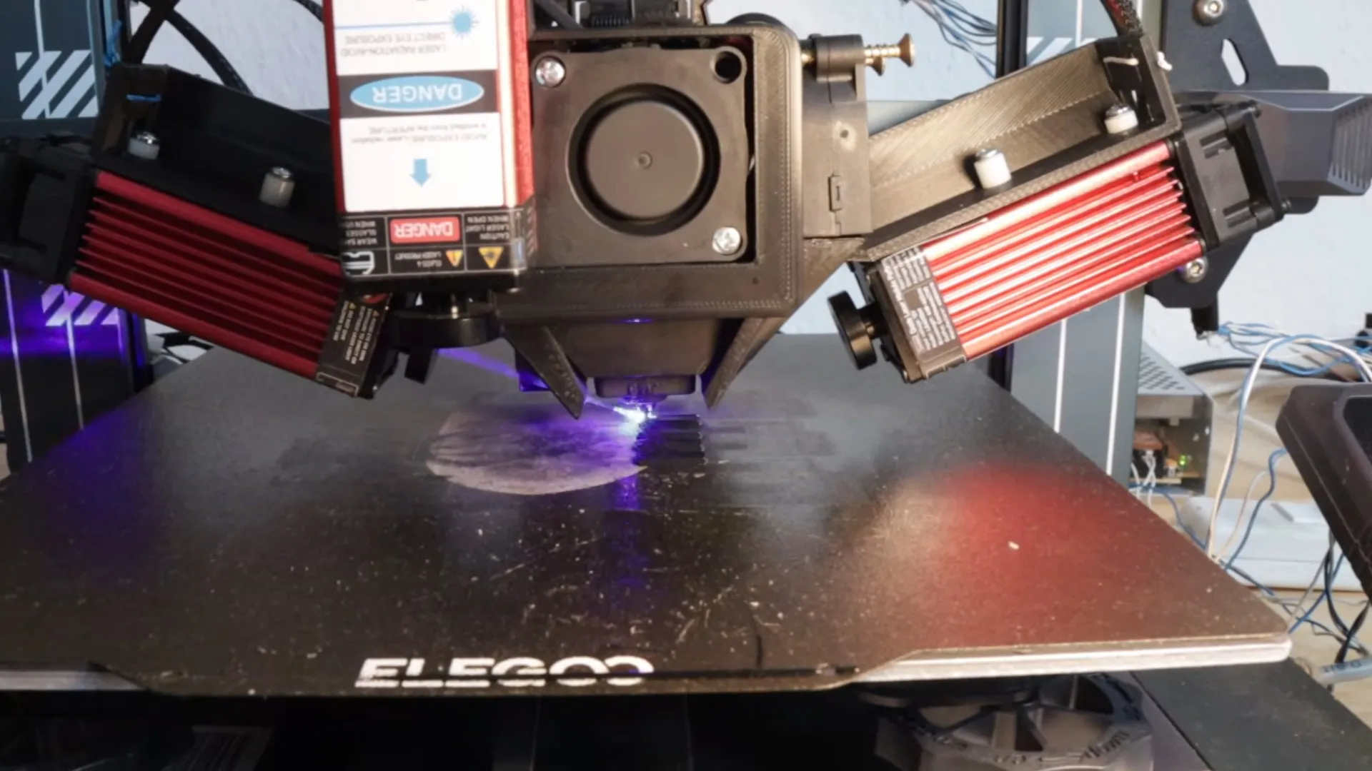 Two Lasers and a 3D Printer: A Simple Hack for Stronger Layer Bonds